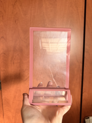 Pink tabletop sign holder