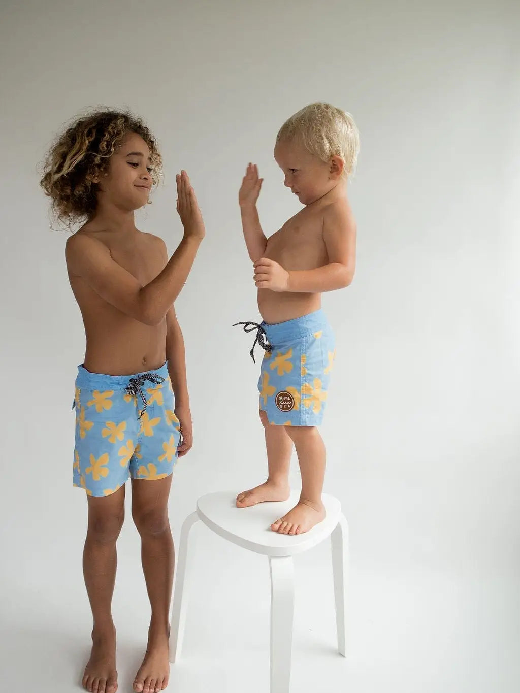 Kids Plumeria Townshorts by Of One Sea